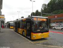 Postauto/PU PAUT SG 12842 (MAN A20 Lion's City) am 20.7.2012 beim Bhf. Herisau