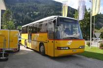 Mark, Andeer. Neoplan N312 (GR 163'715, ex Regie Scuol) bei der Garage in Andeer.