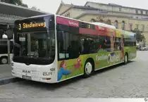 MAN Lion's City  St�dtische Werke �berland Werke Coburg (S�C) Bus und Aquaria GmbH  mit Vollwerbung f�r das Familien Outlet von Haba, Jako-O und Wehrfritz.
