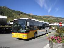 Postauto/Regie Scuol GR 102 394 ''Engiadina'' (Mercedes CitaroII O530LE) am 6.10.2012 beim Bhf. Scuol-Tarasp.