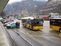Postauto/PU tpc VS 148 210 (MAN A76) am 28.11.2012 beim Bhf. St-Maurice.