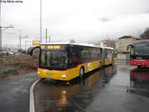 Postauto/PU Buchard VS 223 348 (MAN A23 Lion's City GL) am 28.11.2012 beim Bhf- St-Maurice.