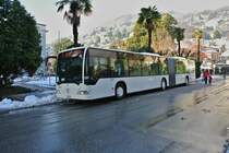 MB Citaro G Nr. 33 auf der Linie 1 bei der Haltestelle Locarno, Via della Pace, 15.12.2012.