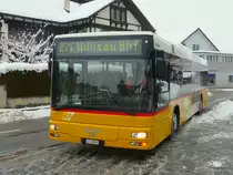 Postauto - MAN  LU 15575 bei der zufahrt bei der Haltestelle am Bahnhof Nebikon am 08.12.2012