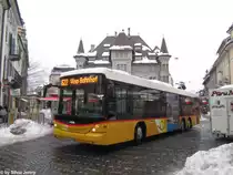 Postauto/PU In-Albon VS 32092 (Scania/Hess K360UB) am 15.12.2012 in Brig, Stadtplatz.