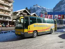 Grindelwald Bus - Mercedes O 404  BE 171240 bei der Bushaltestell in Grindelwald am 26.01.2013