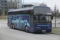 Neoplan Cityliner der Firma Becker-Strelitz Reisen steht als SEV von Rostock Albrecht-Kossel-Platz ber Autobahnrastplatz Recknitz-Niederung West nach Berlin Hbf in Hhe ZOB Rostock Hauptbahnhof/Sd abgestellt.03.02.2012