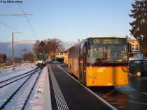 Postauto/Regie Yverdon VD 510 244 (Volvo 8700) am 16.1.2013 beim Bhf. Bercher, dem Endpunkt der LEB Chemin de fer de Lausanne-Echallens-Bercher.