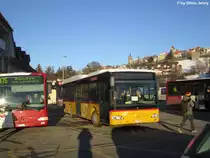Postauto/PU Morattel VD 1055 (Mercedes CitaroII O530LE) am 22.1.2013 beim Bhf. Romont.
