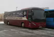 Neoplan Trendliner steht mit Werbung f�ir Die Mecklenburgische B�derbahn  Molli abgestellt in H�he Rostock Hauptbahnhof/S�d.16.02.2013