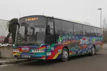 Neoplan Euroliner steht mit Werbung f�r 20 Jahre K�stenbus in H�he Rostock Hauptbahnhof/S�d.17.02.2013