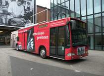 Fr Hausrzte wirbt dieser Mercedes Citaro an der MUBA 2013 in Basel. Die Aufnahme stammt vom 03.03.2013.