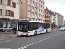 tpn VD 116 230 (MAN A20 Lion's City) am 7.3.2013 beim Bhf. Nyon.