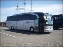 Mercedes Travego von W�rlitz Tourist aus Deutschland in Stralsund vor dem Ozeaneum am 03.08.2012

