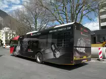Solaris Bus der Post mit der Vollwerbung f�r HAMILTON Uhren auf der Linie 106 am  Bahnhof Interlaken Ost. Die Aufnahme stammt vom 18.04.2013.
