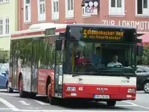 MAN Lion's City  Stadtwerke Marburg , Marburg 29.07.2013
@ Admins: Das Bild ist nicht schief, sondern das Haus. Am linken und rechten Bildrand ist es gerade.