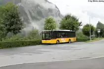 Postauto/PU Bossi GR 152 471 (MAN/G�ppel A66 Lion's Midi) am 9.8.2013 beim Bhf. Filisur